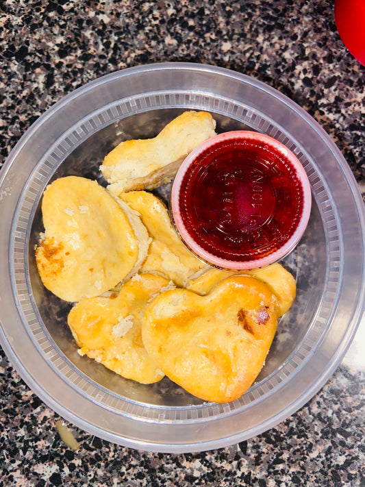 Mini cheesecake heart bites with strawberry d side